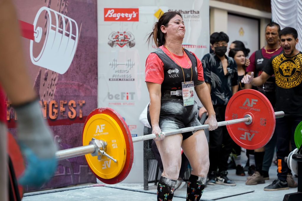 Body Workshop athlete competing in a powerlifting deadlift event