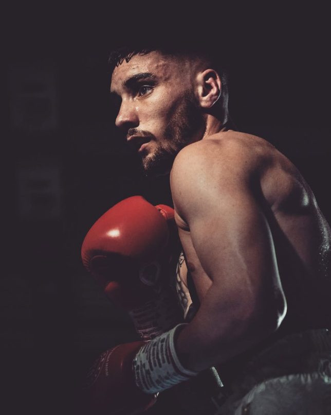 Boxer in an athletic stance representing HIIT boxing conditioning